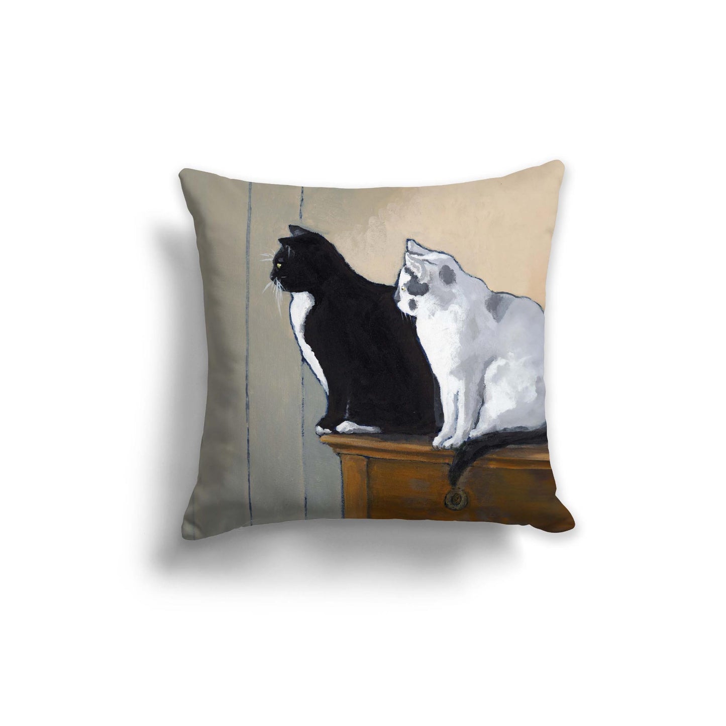 Decorative pillow with two cats on a table design on a beige background