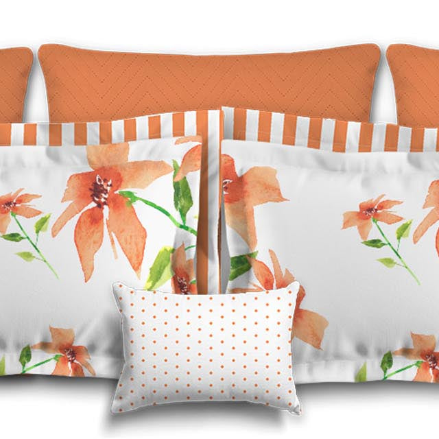 Set of decorative pillows with floral patterns on a white background