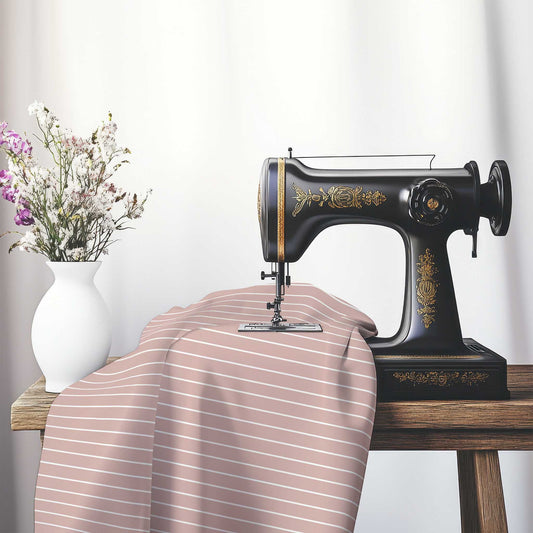 Spun Polyester Fabric with Fine White Stripes on Salmon, FASP-1139-152, on an antique sewing machine sitting on a desk with vase of beautiful flowers.