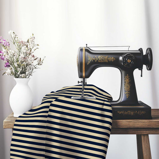 Canvas Fabric with Navy Blue Bars on Tan, FASP-1274-051, on an antique sewing machine sitting on a desk with vase of beautiful flowers.