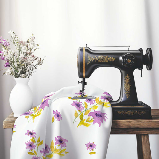 Printed Fabric with Handpainted Mauve Watercolor Floral, FASP-1364, on an antique sewing machine sitting on a desk with vase of beautiful flowers.