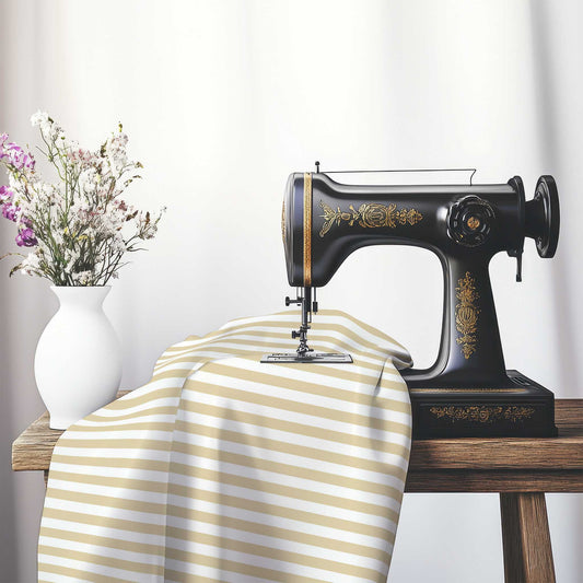 White Spun Polyester Fabric with Tan Bars, FASP-1371-051, on an antique sewing machine sitting on a desk with vase of beautiful flowers.