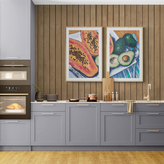 Two Papaya & Avocado Fine Art Prints | Styled in Sophisticated Contemporary Kitchen with Slate Blue Shaker Cabinets, Warm Oak Slat Feature Wall and Copper Cookware