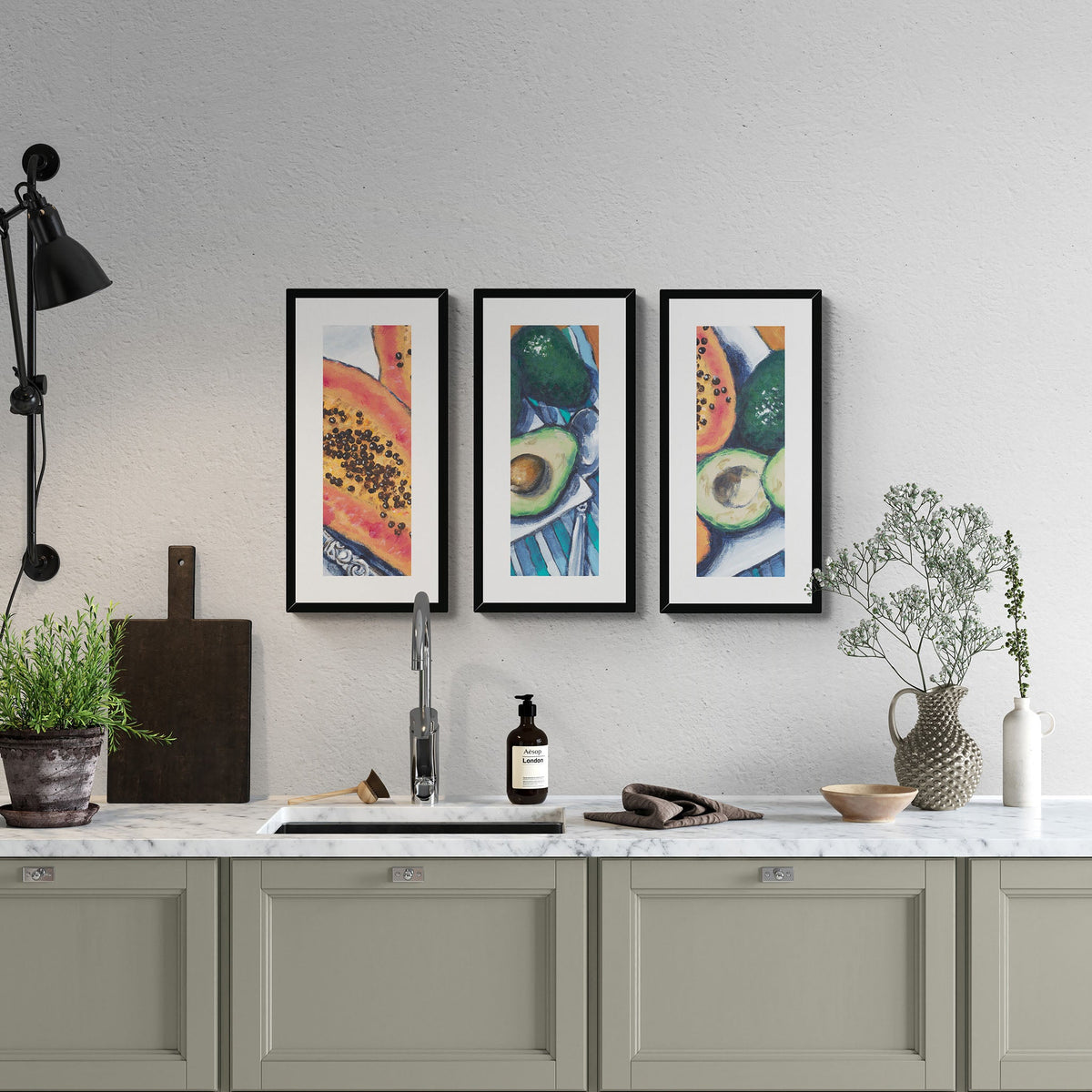 Papaya & Avocado Fine Art Print Triptych | Styled in Relaxed Farmhouse Kitchen with Sage Green Shaker Cabinets, Marble Countertop, Gypsophila Stems and Aesop Hand Soap