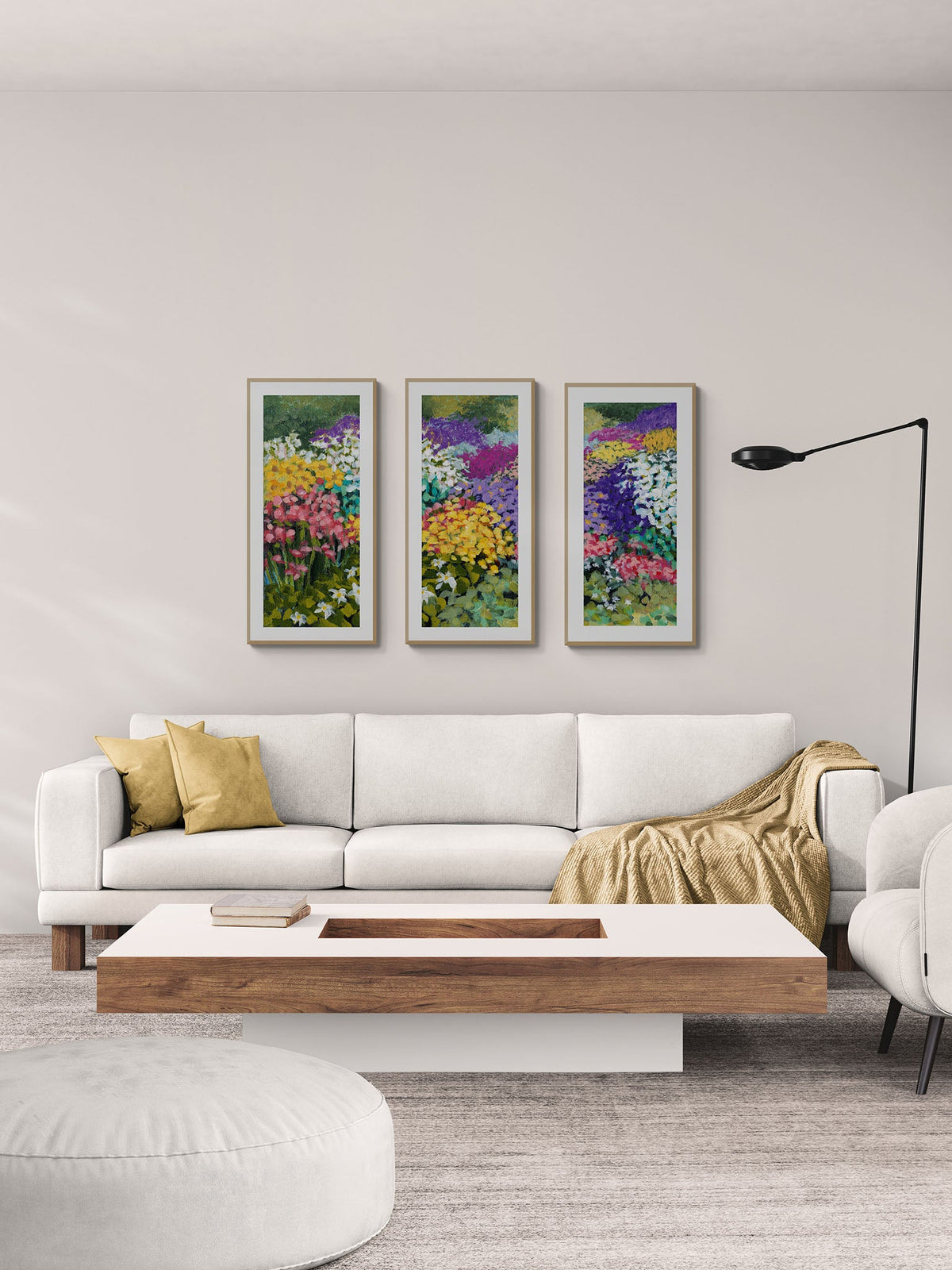 Floral Garden Fine Art Print Triptych | Styled in Bright Scandi Living Room with White Low-Profile Sofa, Walnut and White Coffee Table, Ochre Velvet Cushions and Articulating Floor Lamp