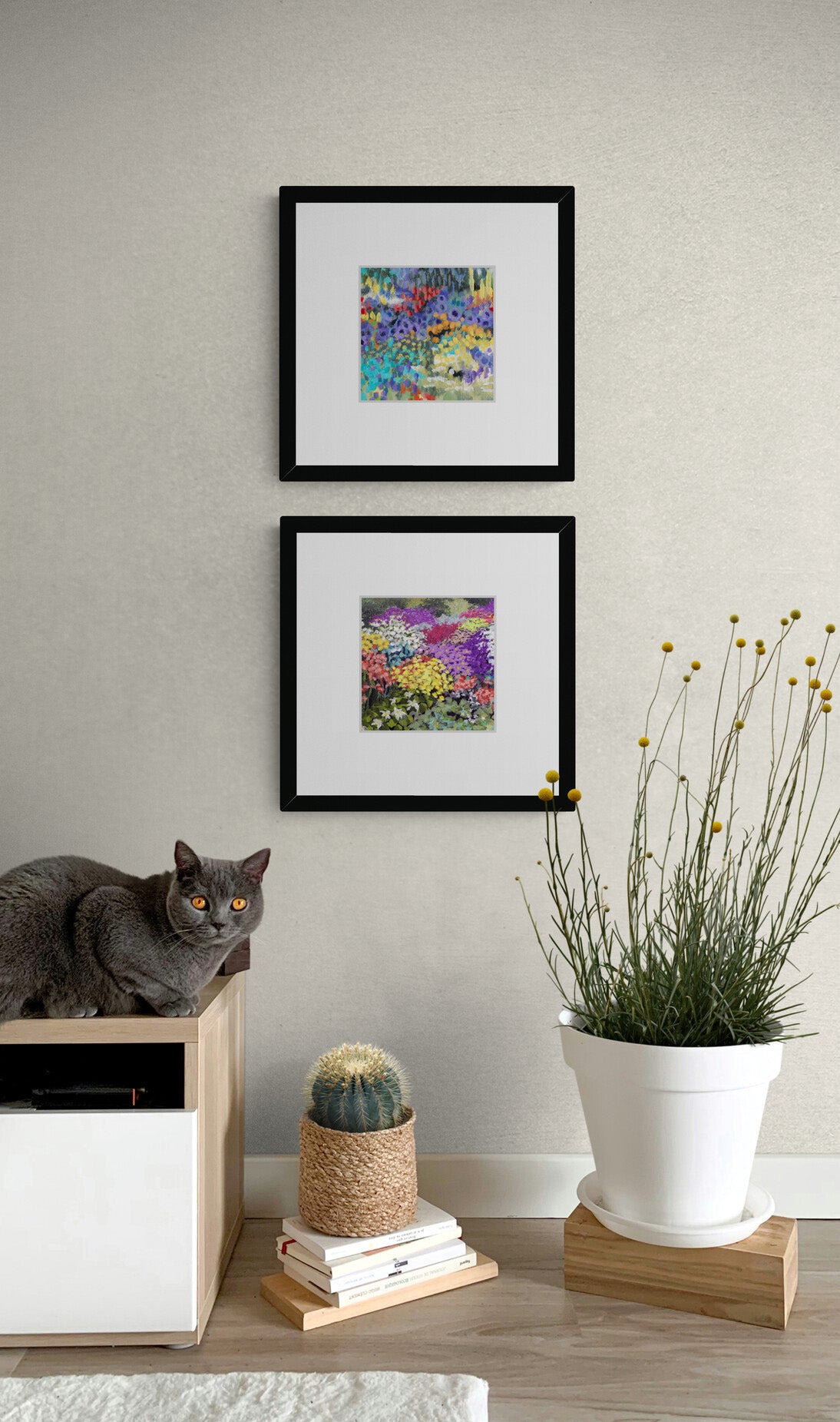 Two Floral Garden Fine Art Prints with Faux Mat Board | Styled in Calm Minimalist Corner with Oak Media Unit, Curious Grey Cat, Barrel Cactus and Billy Button Wildflower Stems