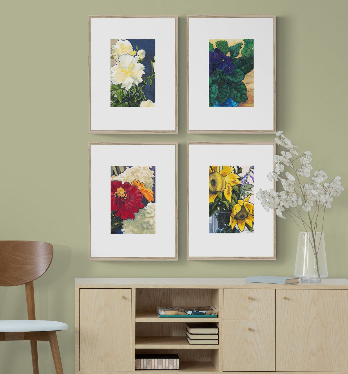 Four Floral Fine Art Prints with Faux Mat Board | Styled in Calm Sage Green Study with Blonde Wood Credenza, Walnut Mid-Century Chair and Dried White Eucalyptus Stems